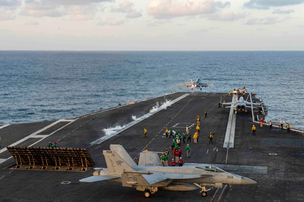 Our catapults can launch up to 80K lbs, at 140 knots. Pictured here is an F/A-18F Super Hornet, attached to the "Fighting Swordsmen" of Strike Fighter Squadron (VFA) 32, launches from the flight deck. 5/5