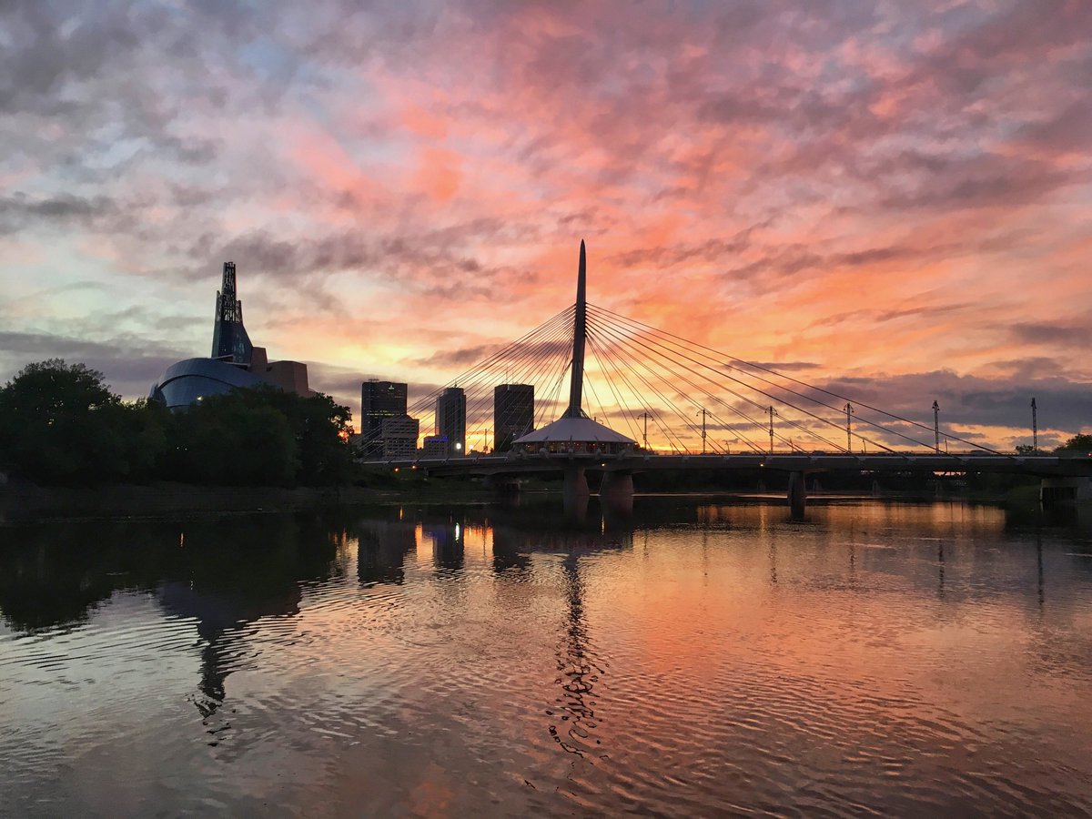 June: The summer months bring thunderstorms and more activity along the river. I love the long days and taking sunset walks at 10 pm.  #Winnipeg  #photography 7/