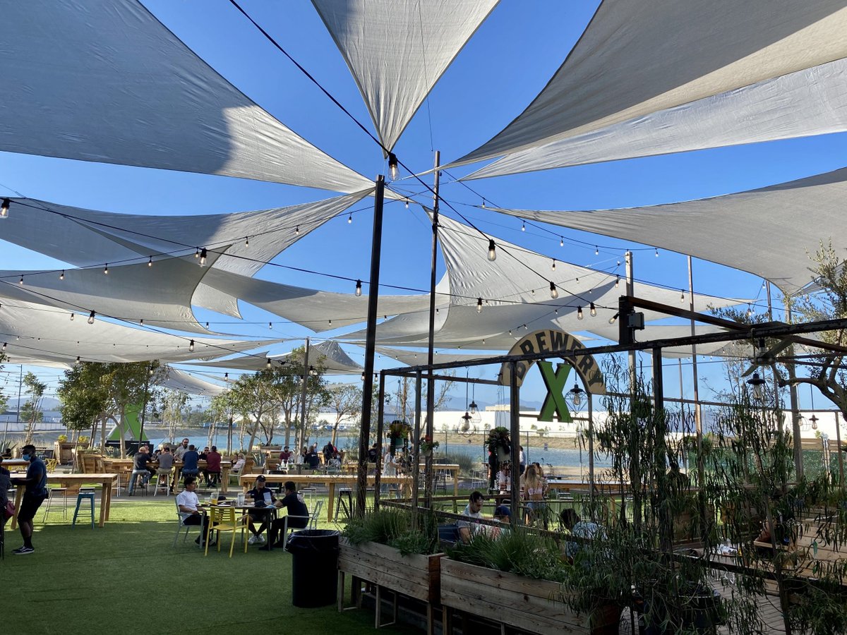 TheHOPodcast's tweet photo. Founded in 2018 by beer industry veterans, Brewery X has expanded their lineup to all sorts of fun styles including sours, seltzers and so much more. Catch some rays while sipping on some dope beers at their Biergarten!

Ep.70 out now!

#craftbeer #podcast https://t.co/Zz390bSs0q https://t.co/Dk1eWhHWPO