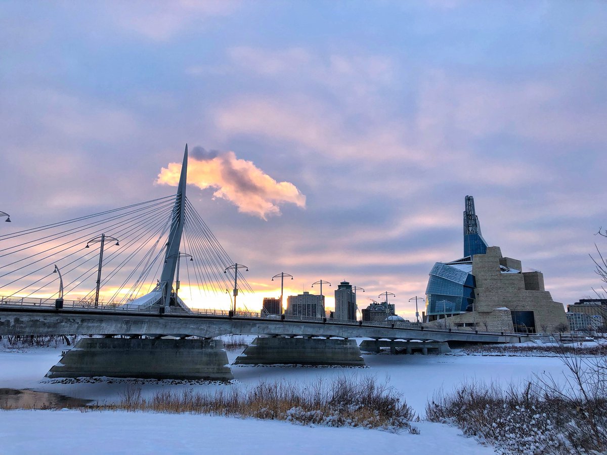 December: The sun has shifted south of my usual vantage point, but still affords some lovely colours. Last December, the  @CMHR_News added some new interest by lighting the building so beautifully. I hope they do it again.  #Winnipeg  #photography 13/14