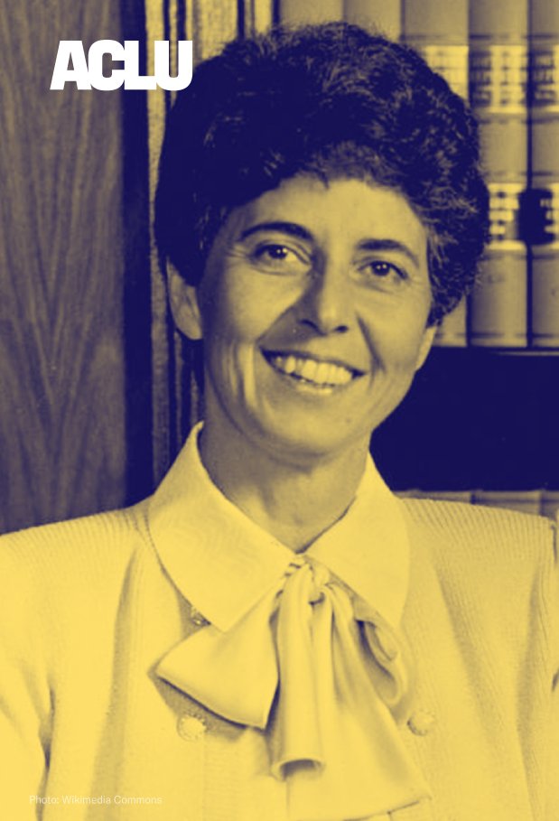 Portrait of a woman taken from the shoulders up. She has a short pixie-style haircut and is smiling toward the camera. The photo is overlaid with a yellow and blue tint. 