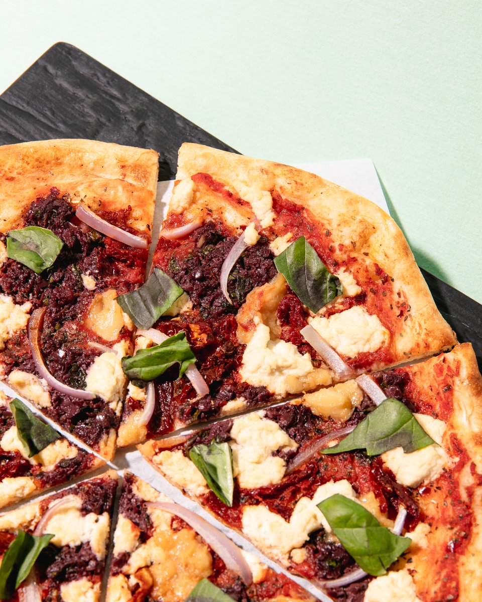 MEDITERRANEAN – Made with our San Marzano Tomato Sauce base, topped with an Olive Tapenade, Sun-Dried Tomatoes, Confit Garlic, our house-made Tofu Feta, Red Onions, and finished with Fresh Basil.⁣ Have you tried this new favourite yet?