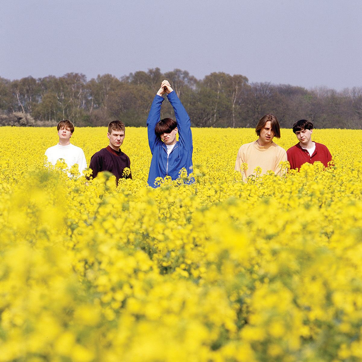 Okay, this is mad:  @martin_j_wilson has pointed out that in addition to the original photo, there are also The-Charlatans-standing-about-in-oilseed-rape photo sessions from 1995 and 2009! What's the obsession with trampling crops,  @Tim_Burgess?