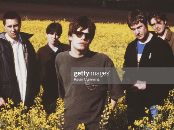 Okay, this is mad:  @martin_j_wilson has pointed out that in addition to the original photo, there are also The-Charlatans-standing-about-in-oilseed-rape photo sessions from 1995 and 2009! What's the obsession with trampling crops,  @Tim_Burgess?