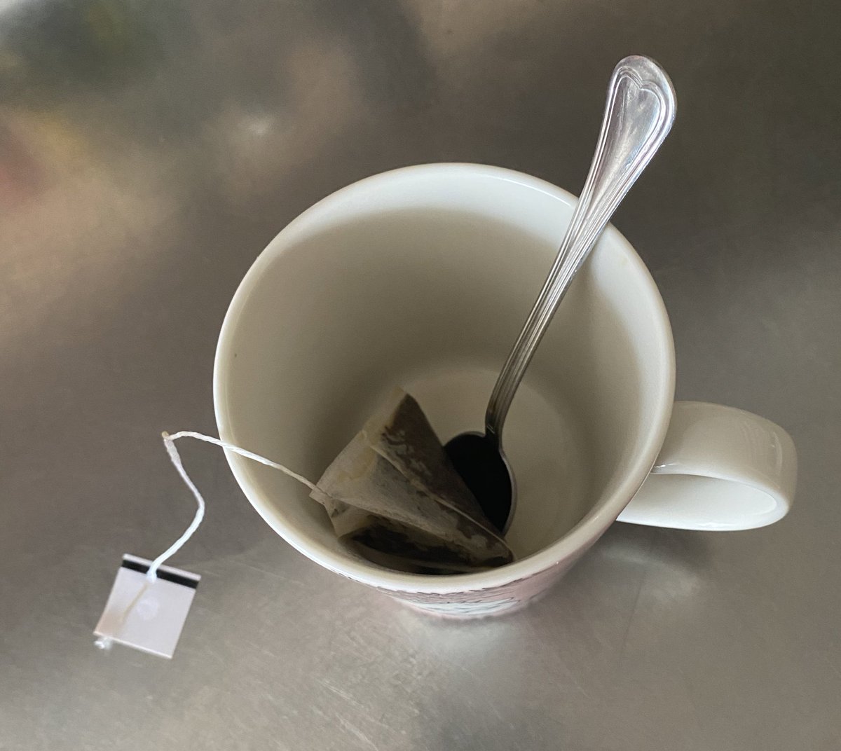 step 8. put the once used tea bag in your now empty cup