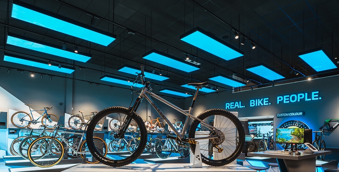 Ribble Cycles wanted their showroom to provide a truly immersive experience. The LED "Lightframe" with RGBW LEDs were provided, giving complete DMX control for this amazing Clitheroe store. The units are controlled wirelessly, all linked to 'touch' control.