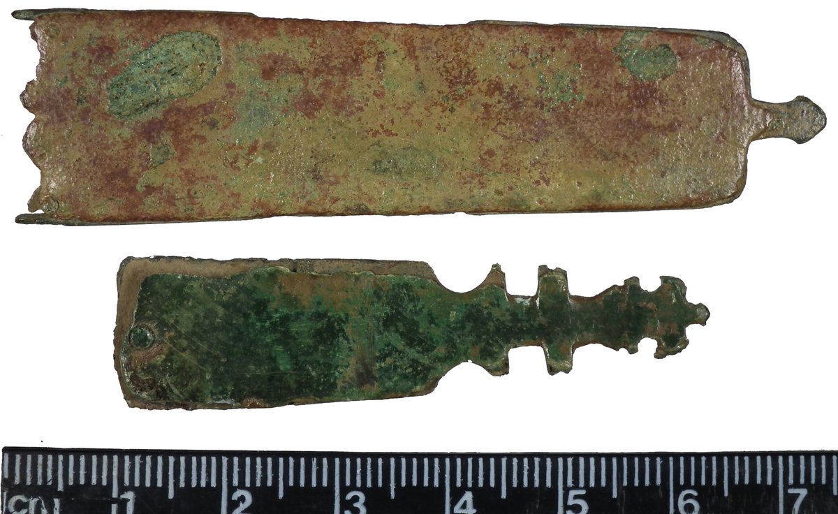 Two medieval strap ends found about 2001
Top one has recess occupied by moulded sinuous stem terminating in an acorn. Acorn at terminal of strap-end also.
Dating AD 1350-1450