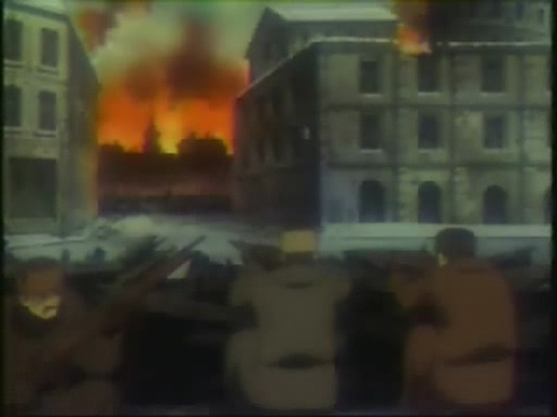 The episode starts with a flashback to Maria in a war. The VHS (right) identifies it as Moscow. On the DVD (left) this is a few seconds and a different scene. The VHS this is almost a three minute scene, and there's a red blood splatter for the captain getting shot.