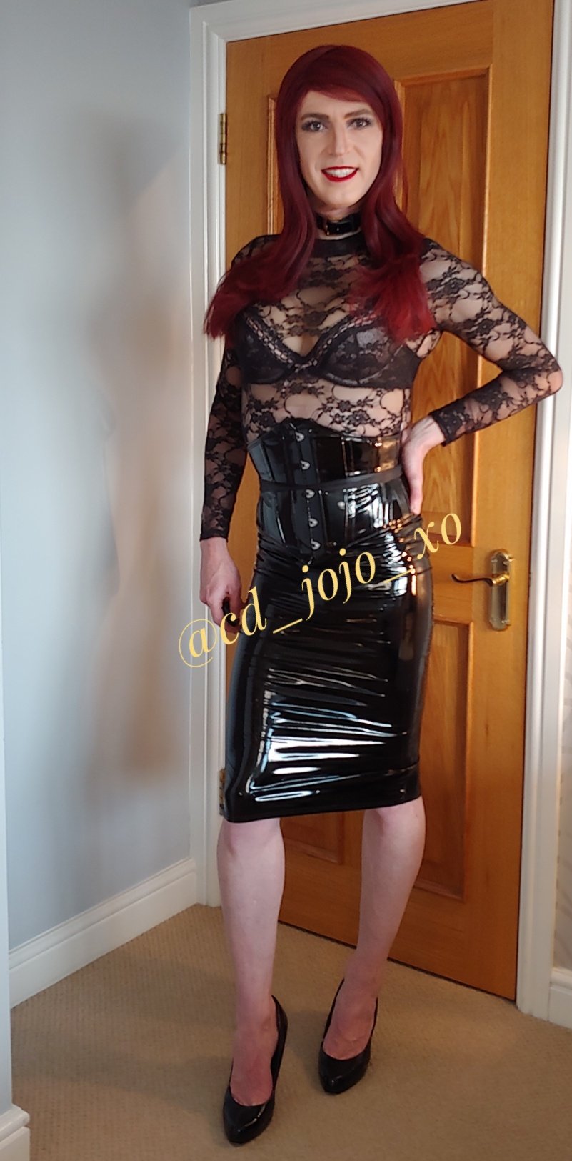 crossdresser in corset.