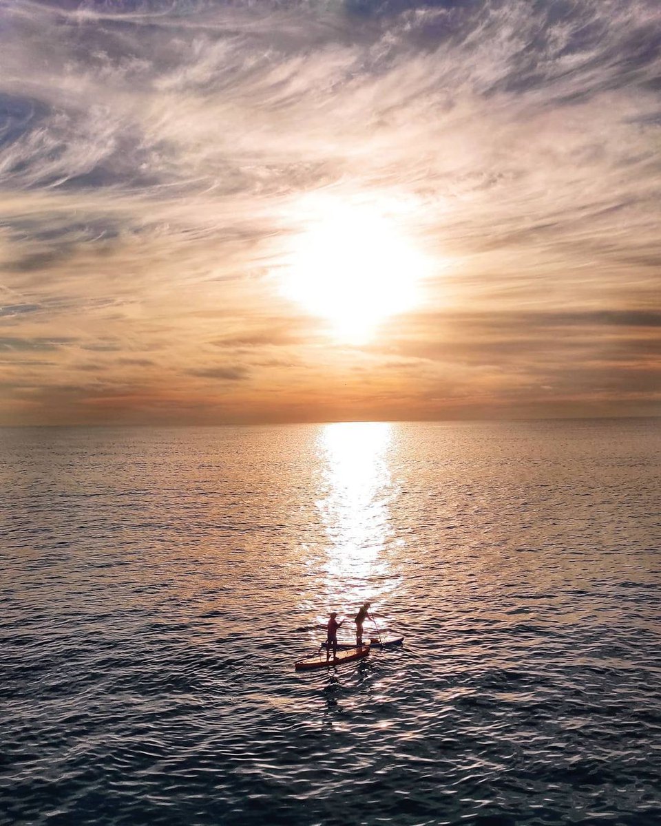 southafricauk's tweet photo. You've probably seen people standing up on a board with a paddle in their hand and are wondering about it. Stand Up Paddle (SUP), is a fun way to explore 🇿🇦coastline and even catch waves and ride them like how you'd do on a surfboard!🏄‍♂️🌊📸I/G @lolli_lauren_101 #gqebera #Mzansi https://t.co/549jVunGVX