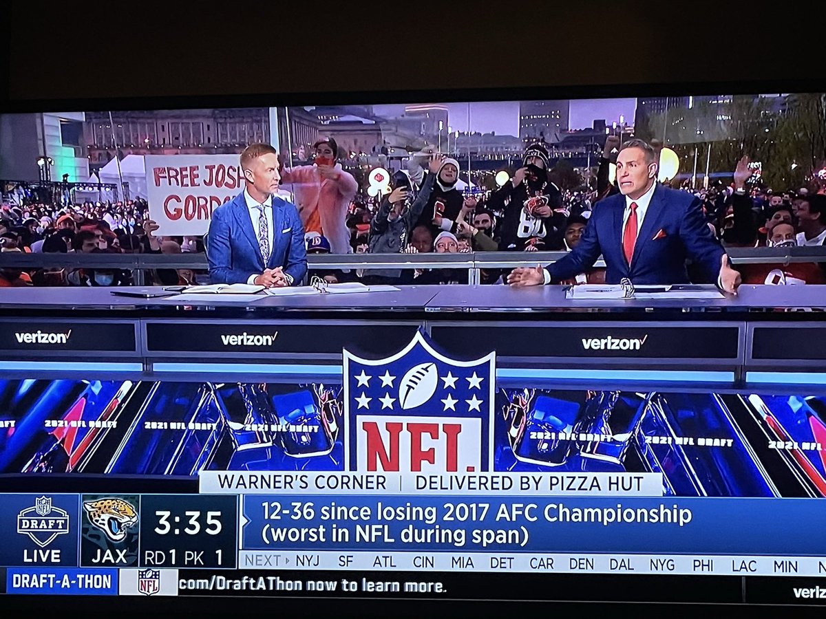 hgurley6's tweet photo. Free Josh Gordon sign is winning right now #NFLDraft2021 https://t.co/dP7qCYcRFI
