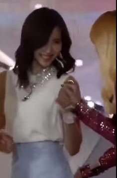 twice mina and lisa holding hands