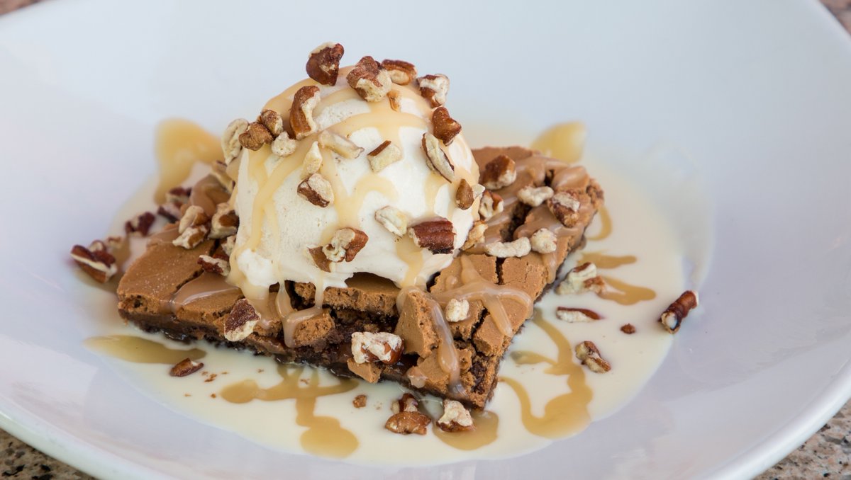 Let the weekend indulgences begin!⁠
⁠
Our Chocolate Gooey Butter Cake will have your mouth watering to the very last bite 🤤⁠