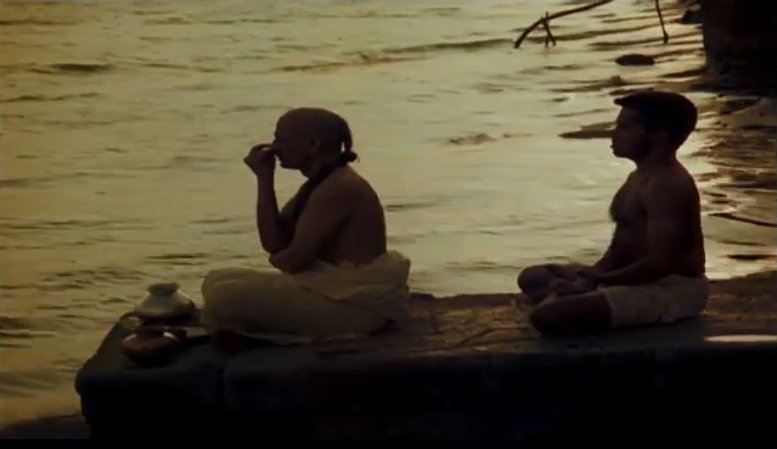 Mandana Mishra doing Sandhya, while the death sits just behind him. Symbolic of how he would have thought death was subservient to karma while he still was a Mimasaka (my guess).