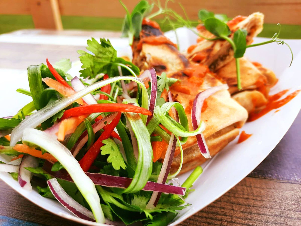 Lymefield's tweet photo. One of our 'specials'... we're looking forward to serving Sri Lankan #StreetFood - Stuffed Lamb Mince, wrapped in homemade flatbread, with red pepper sauce and onion, chilli & coriander salad.
#Lymefield #TeaRoom #Food #Takeaway https://t.co/3wXfX25bUK