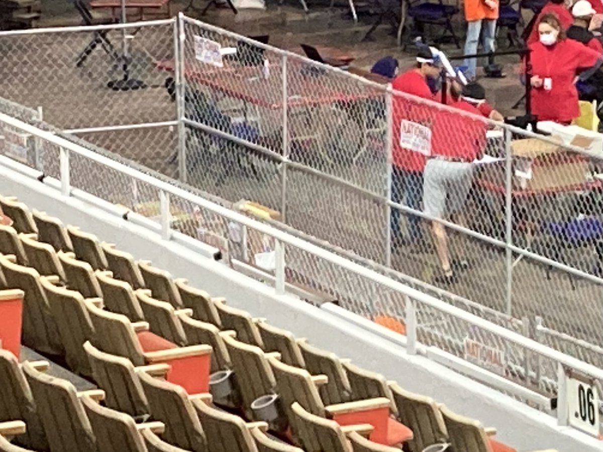 Two men did some more shuffling with the boxes in the fenced area marked “complete” and this is the best view I can get of them. I can count 5 but could be more against the wall out of view.