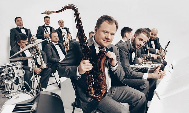 Russia's tweet photo. #JazzDay is reason to discover (if you haven't already!) Russia’s world-famous sax player Igor #Butman &amp; his jazz bands.

❗Don't miss Butman's performance at 2021 International Jazz Day event by @UNESCO! Watch live at upcoming midnight:

 🔗 https://t.co/pCWgkdggM5 https://t.co/YUNXe8GkDx