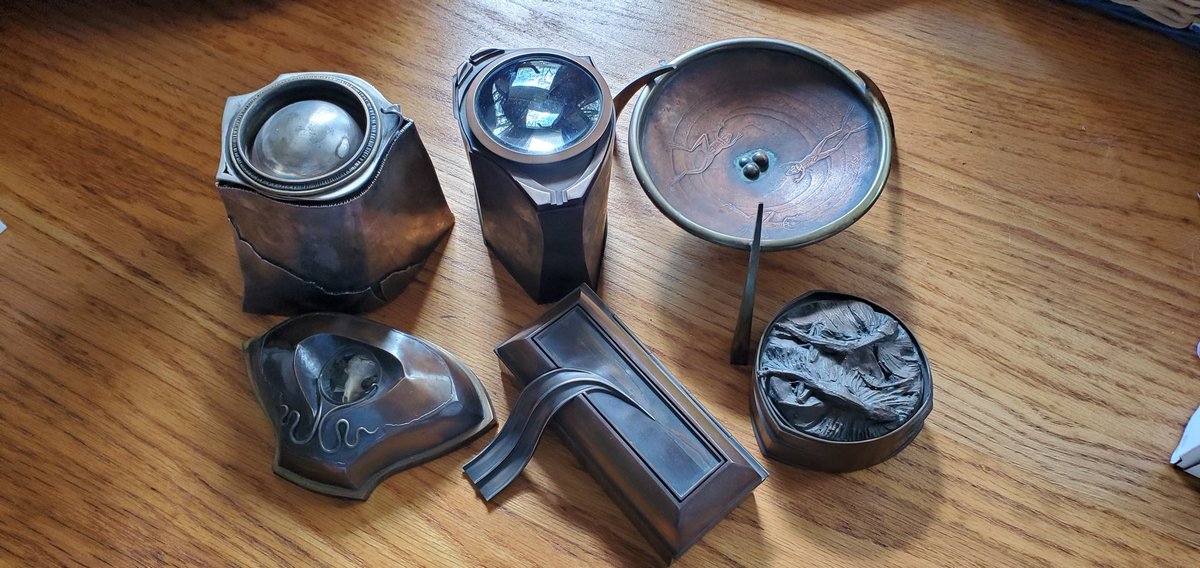 Just recently he told me that when he first started bronzework, he loved making vessels and actually dug out a few, two of which he wants us to use for his ashes, which is really amazing that we'll have that. These are some of his earlier creations.