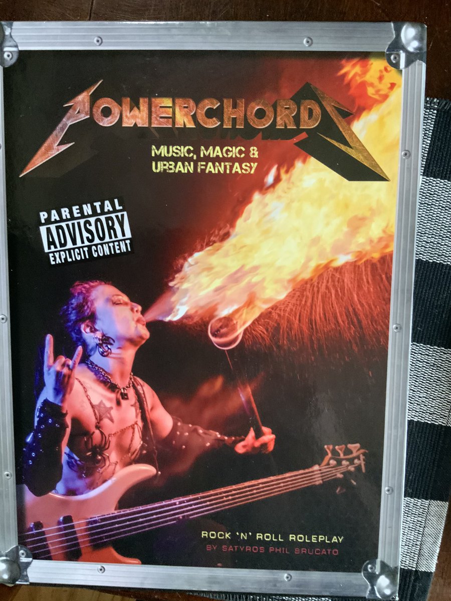 Next, now, this is very cool. I have been looking forward to this. It’s POWERCHORD, MUSIC, MAGIC & URBAN FANTASY. It’s a musical setting for role-playing, and it’s gorgeous and unique. Written by a musician/dj/roadie,  @SatyrosBrucato. It’s FASCINATING.7/