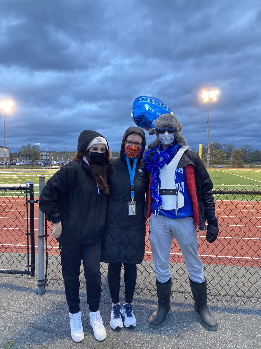 Pep Band Co-Presidents cheering on the bison at their last game! 💙🤍