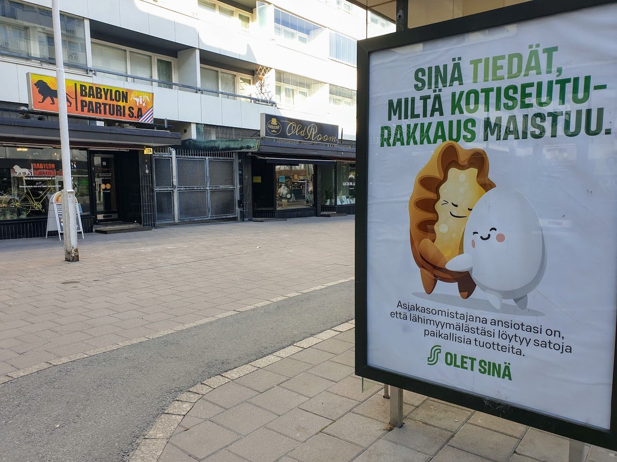 More barbershops open in the background, but actually I wanted to take a photo of this ad that is unrelated to the thread. I think you have to know Finnish food culture to understand the picture in the ad.