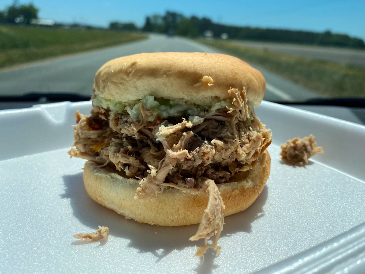 Enjoying a damn fine chopped pork sandwich at Wilber’s BBQ in Goldsboro. They have an efficient drive-thru set up, so I’m enjoying this while my ever-patient wife drives. Now serving baby backs on Saturday. – bei  Wilber's Barbecue