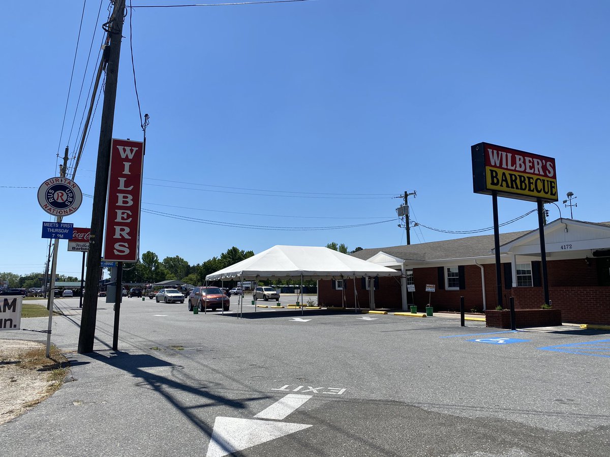 Enjoying a damn fine chopped pork sandwich at Wilber’s BBQ in Goldsboro. They have an efficient drive-thru set up, so I’m enjoying this while my ever-patient wife drives. Now serving baby backs on Saturday. – bei  Wilber's Barbecue