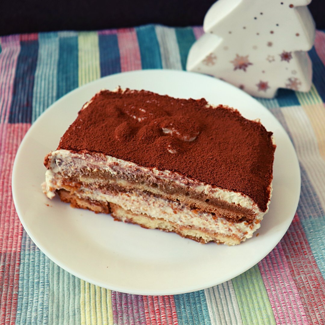 Tiramisu is an Italian dessert made with layers of ladyfingers (Italian biscuits with a dry sponge like texture) soaked in a mixed of strong brewed coffee and Marsala or rum and filled with rich and creamy mascarpone cream.