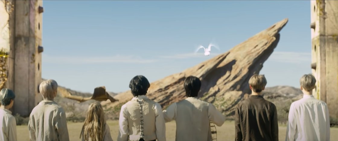 Happening simultaneously, the guys are now back together (minus JK) and they brought more people with them to the gates of Heaven. The dove Jin thought was dead came back to life, and now he sets the dove free! The Holy Spirit is flying out into the world!