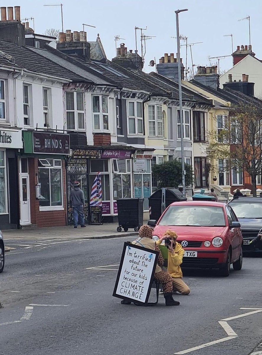 A one person protest in Brighton concerned about climate change, one person can make a difference ....