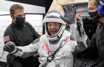 Japan Aerospace Exploration Agency (JAXA) astronaut Soichi Noguchi is helped out of the SpaceX Crew Dragon Resilience spacecraft onboard the SpaceX GO Navigator recovery ship after he, NASA astronauts Mike Hopkins, Shannon Walker, and Victor Glover, landed in the Gulf of Mexico off the coast of Panama City, Florida, Sunday, May 2, 2021.