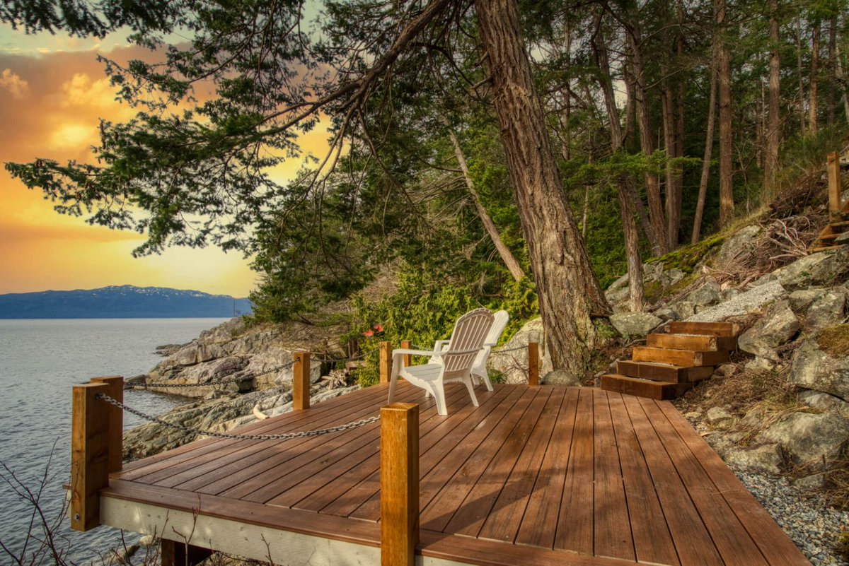 Coming Soon! 2.48 acre waterfront beauty! Sweet 1,800 sq ft cottage and ~1,200 sq.ft carriage house.