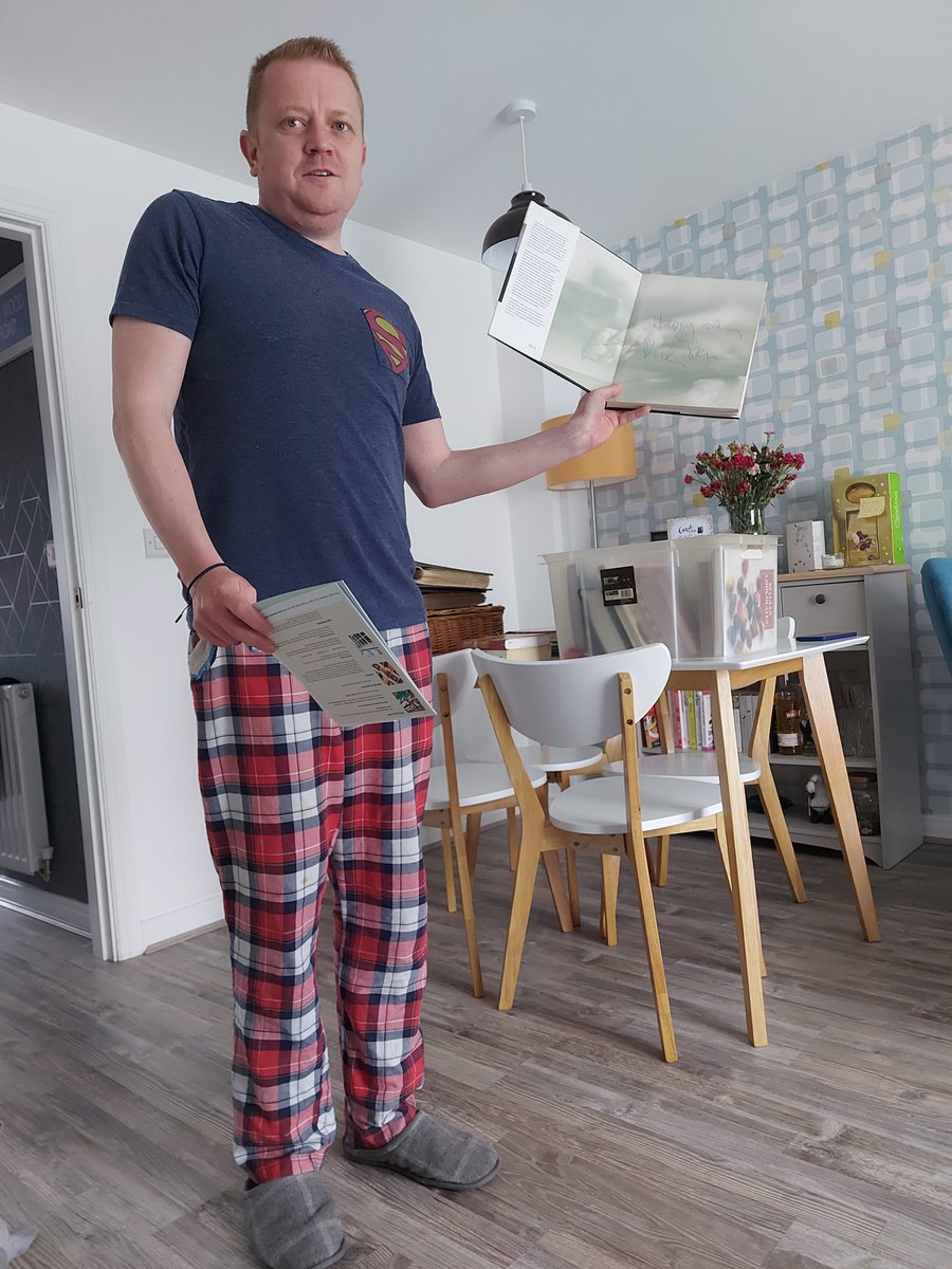 Chris showing off his signed cookbooks retrieved from his late dads house. In his element and I expect lots of delicious meals! There's like 20 books there!