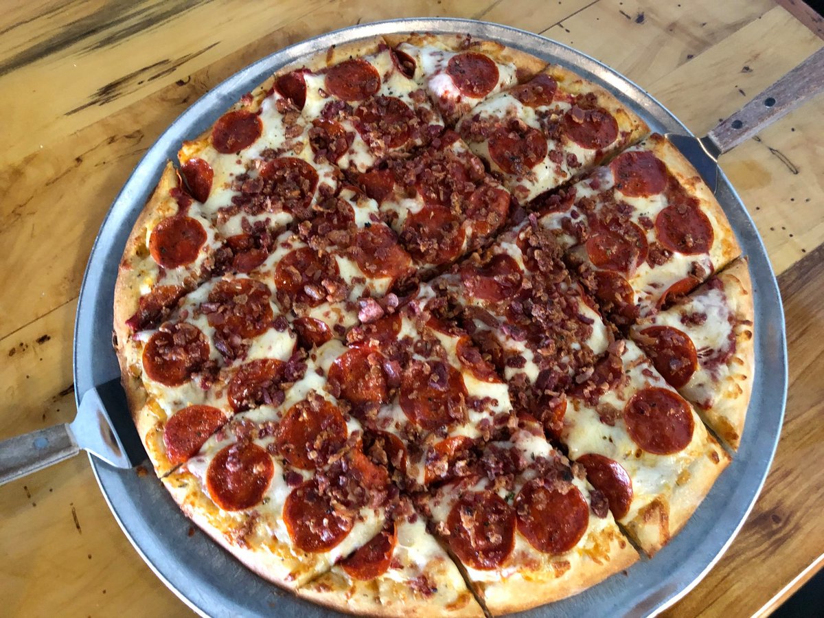 Guess what?! We are celebrating our 30th year anniversary ALL MONTH LONG! Buy any 14" or larger pizza and get one of the following for FREE: Garlic Cheese Toast, A Stuffed Breadwick,  A full order of Breadsticks! 🎉🤗

(not valid on GrubHub or DoorDash or with any other offers)