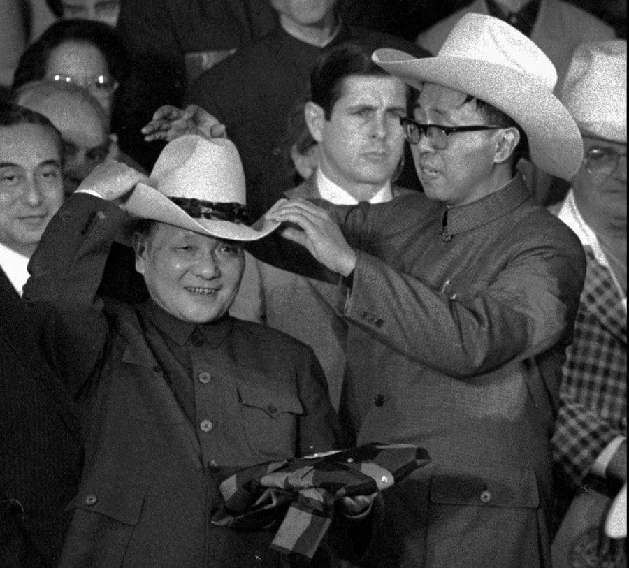 Deng toured the factory floors of Boeing and Ford. He visited NASA in Texas and sat on top of the Lunar Rover. He attended a rodeo and donned a ten-gallon cowboy hat in a moment famously captured on camera.24/n