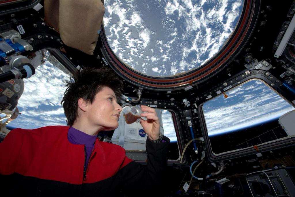 NASAhistory's tweet photo. Words cannot espresso how important coffee is! ☕ 

 #OTD in 2015, @esa Astronaut Samantha Cristoforetti (@AstroSamantha) drank the first espresso in space. We love this picture a latte! https://t.co/LutNYMAN9h