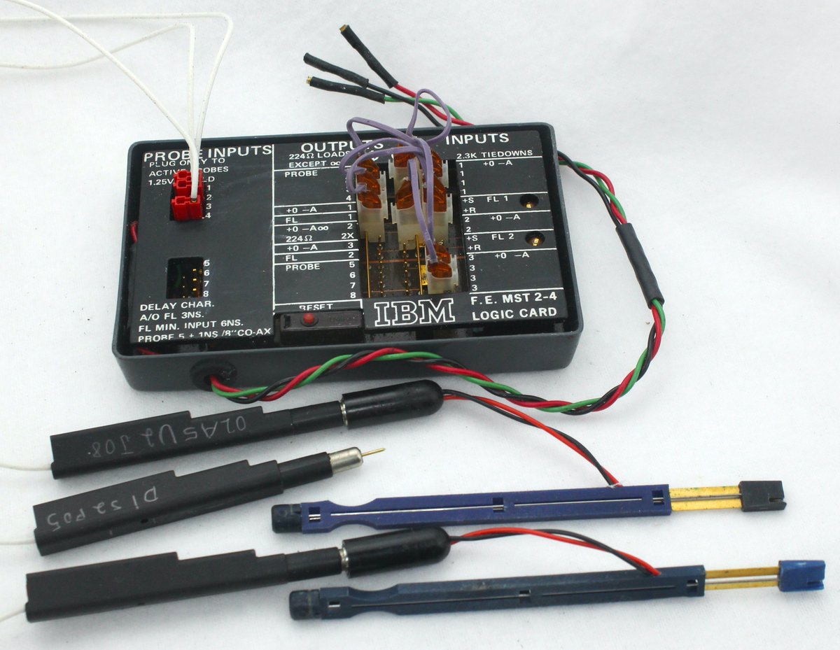 kenshirriff's tweet image. How do you debug a 1970s IBM mainframe? With the help of the Field Engineer MST Logic Card! This little box has two LEDs, latches, and a couple of gates that can be wired together. You can plug 8 logic probes into it and see when you get the signals you're looking for.