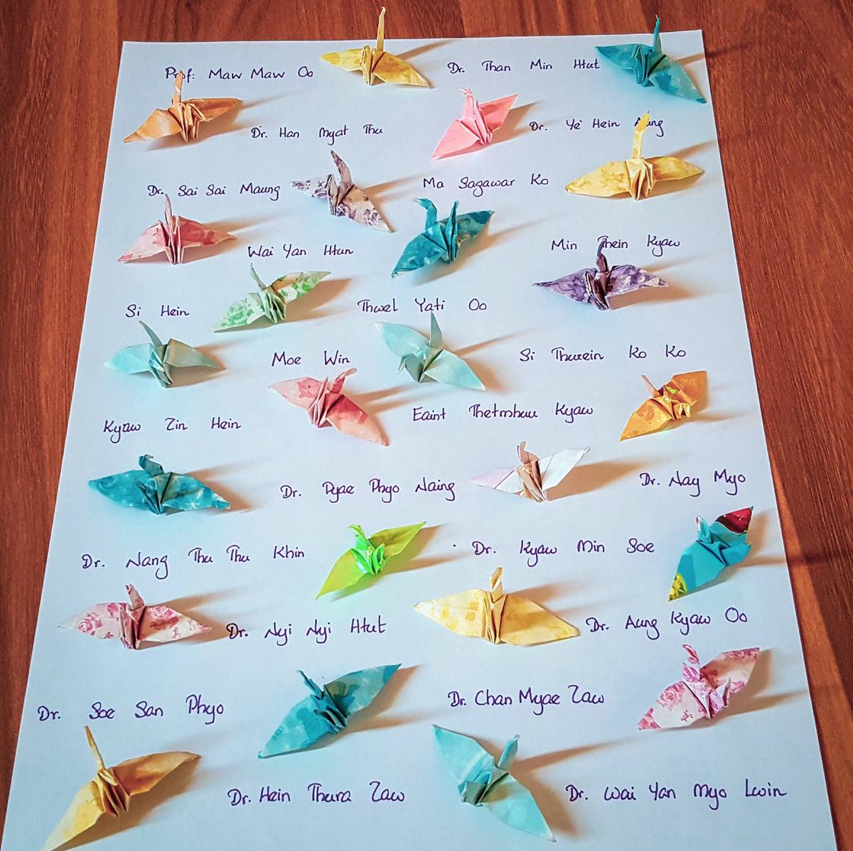 Calling for an immediate release of all the detained doctors and health  professions with the names of detainees along with paper crane. Humanitarian workers are not a target to be shot, tortured or detained. #May4Coup #WhatsHappeningInMyanmar