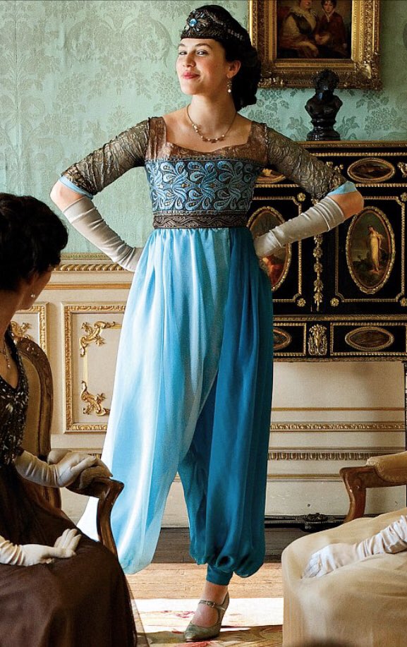 JessicaBull50's tweet photo. @Ingrid_Mida @vintieguidebook @metmuseum That is so beautiful, it must have been the inspiration for Lady Sybil’s trouser suit in #DowntonAbbey ? I’ll have it in a size 14 (alright 16) please. Seriously, we don’t see enough turquoise clothing about. https://t.co/lcYRmIFfzQ