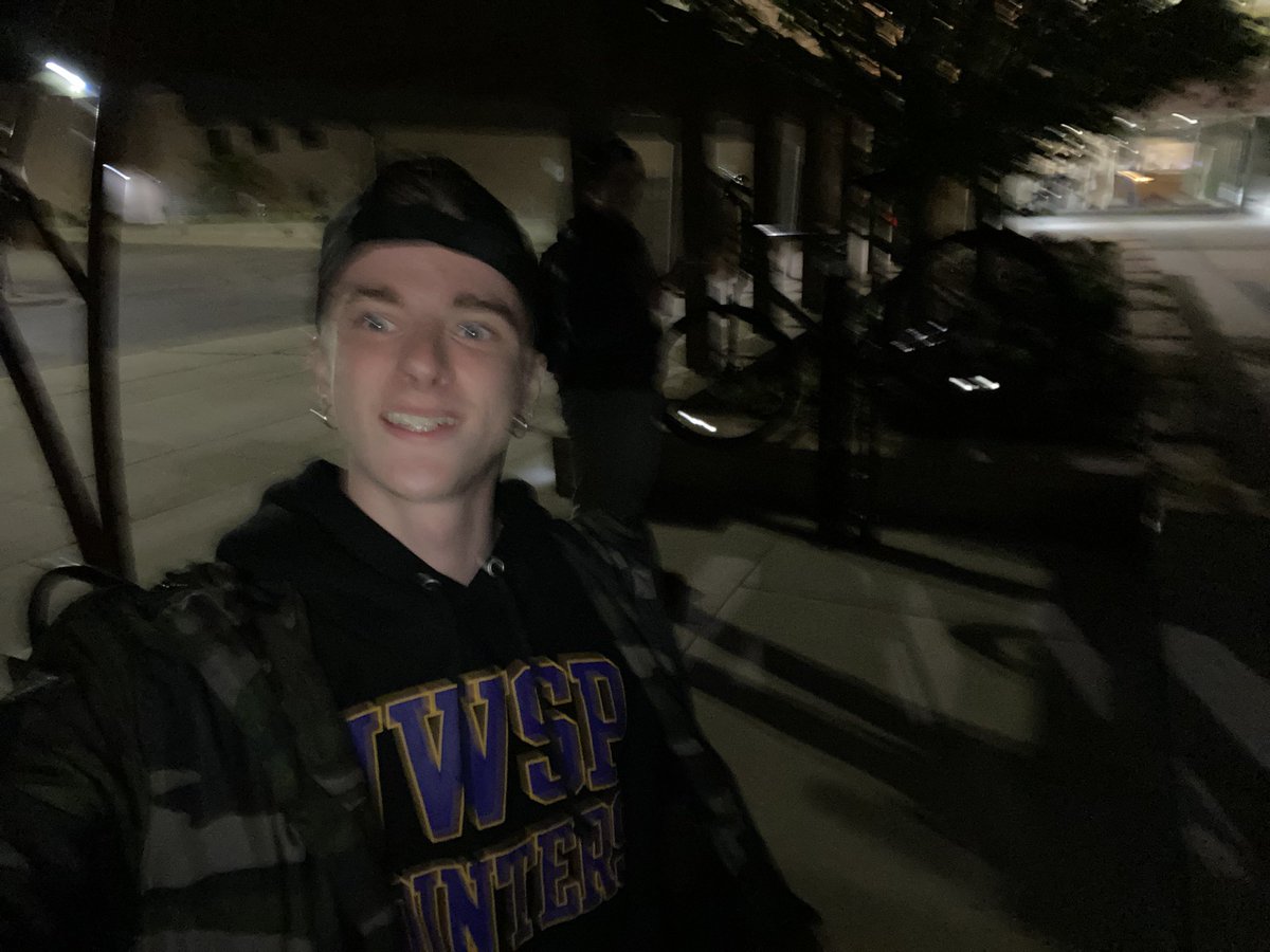 cloinsnothere's tweet photo. blurry picture of VP Scheder fixing his bike late at night. #107 maybe #UWSPGivesBack #UWSP #UWSPDayOfGiving #UWSPDOSChallenge https://t.co/6DHbqkno4W