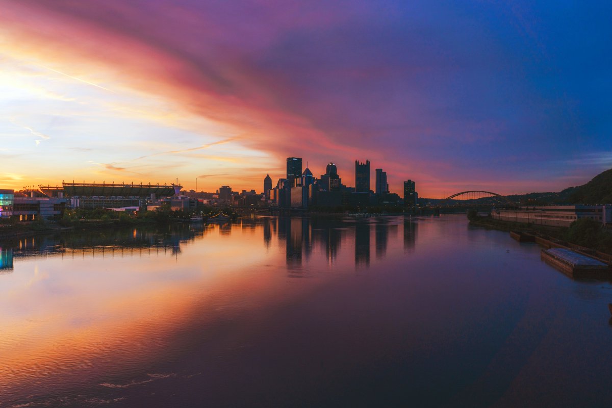 DaveDiCello's tweet image. Calm waters and the West End Bridge aren't two things often heard together. Between the rivers forming the Ohio and barge traffic, the water is usually pretty choppy. But it was still on this particular morning, allowing for reflections of #Pittsburgh and this incredible sunrise.