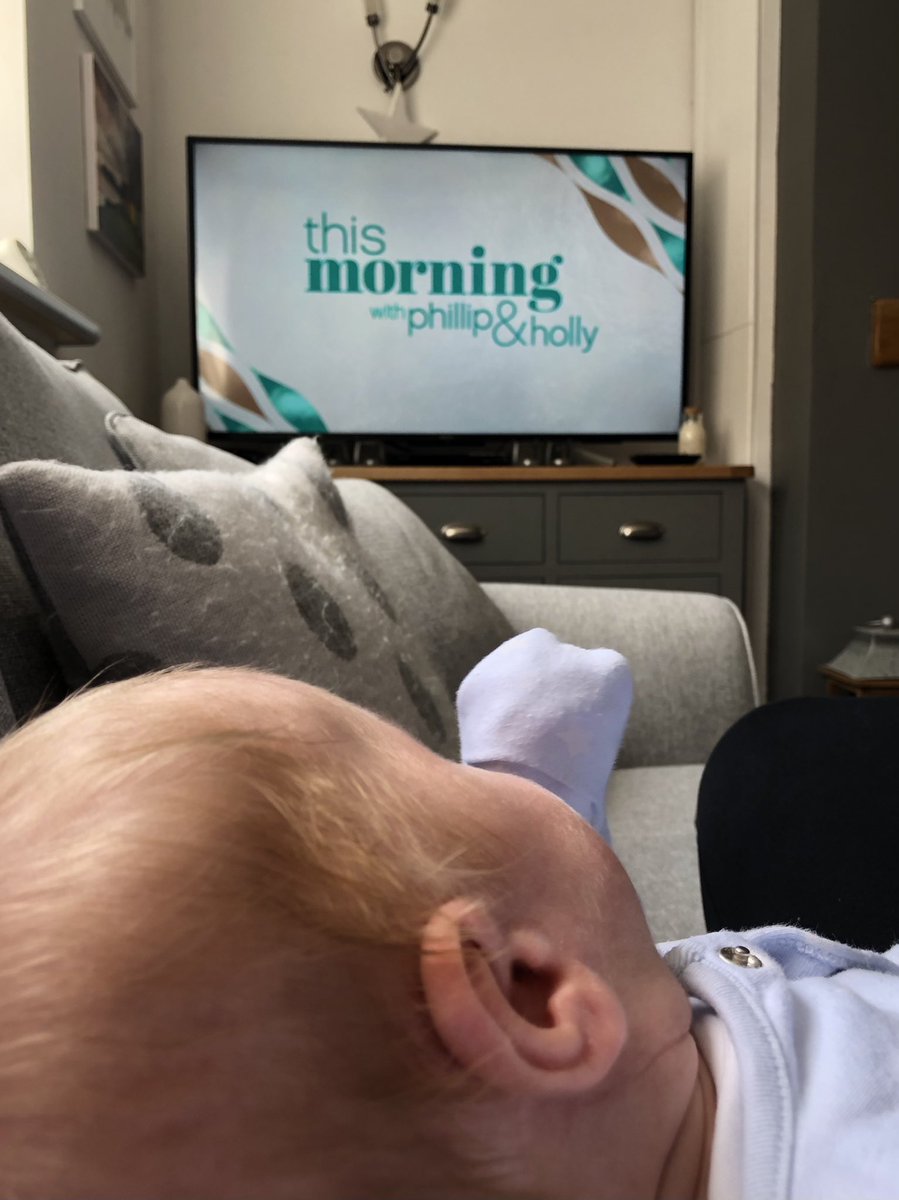 Sat chilling with Mummy after my jabs watching <a href="/Schofe/">Phillip Schofield</a> and <a href="/hollywills/">Holly Willoughby</a> on <a href="/thismorning/">This Morning</a>