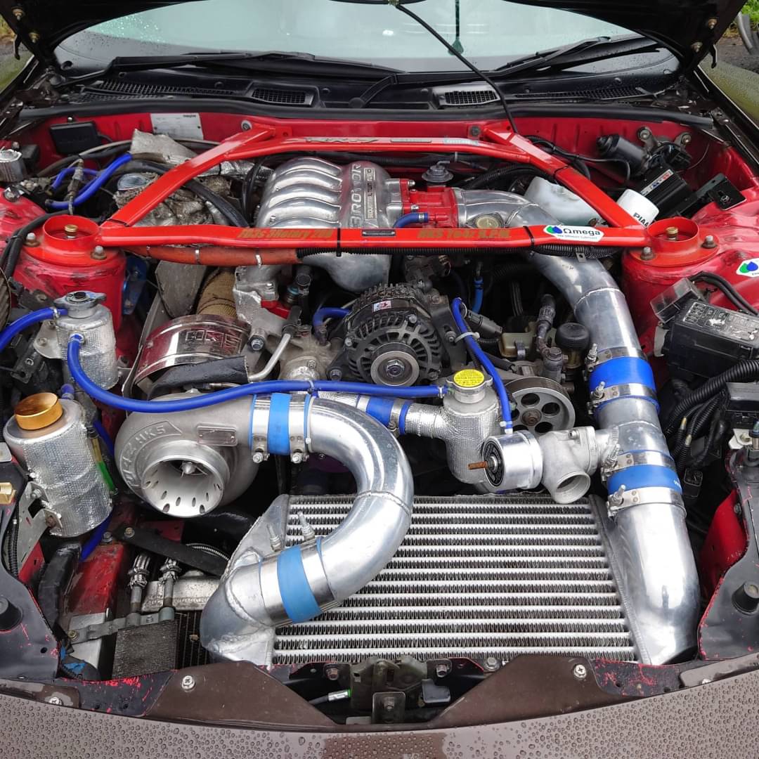 Fdb7 たけさん 全国twitterrx7ミーティング21 Rx 7に3ロータリーシングルタービンとシーケンシャルミッション入れてボンネット ドア リアゲートカーボン エンジン強化してサイドポート拡張 ウェストゲート2つ コンピューターはフルコン