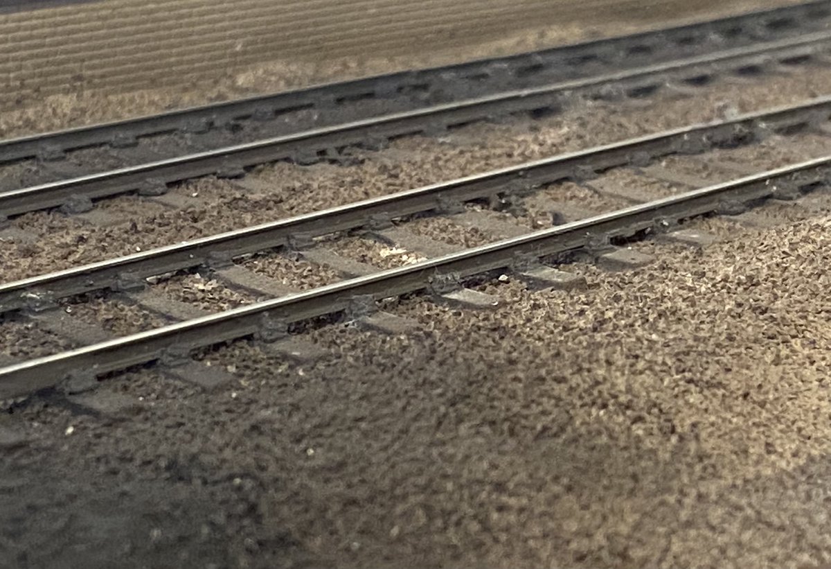 Today’s trackwork image - concrete sleepers. These were individually laid using C&L plastic sleepers and Peco pandrol clips. The sleepers have been painted using Plastikote suede, and the rails have been painted using railmatch frame dirt #emgauge #track @DemuShowcase
