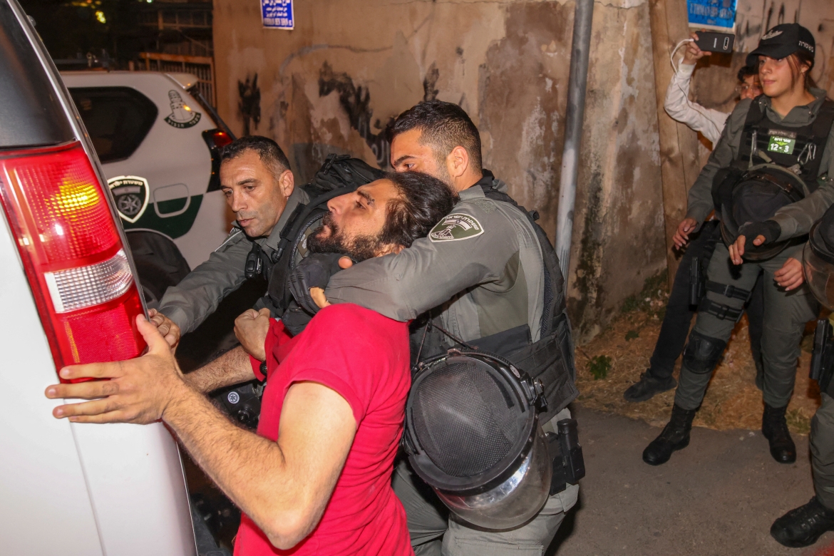 6) The families defending their homes from settlers have been met with violence from Israeli forces and settlers. Photo credit: Ahmad Gharabli/AFP