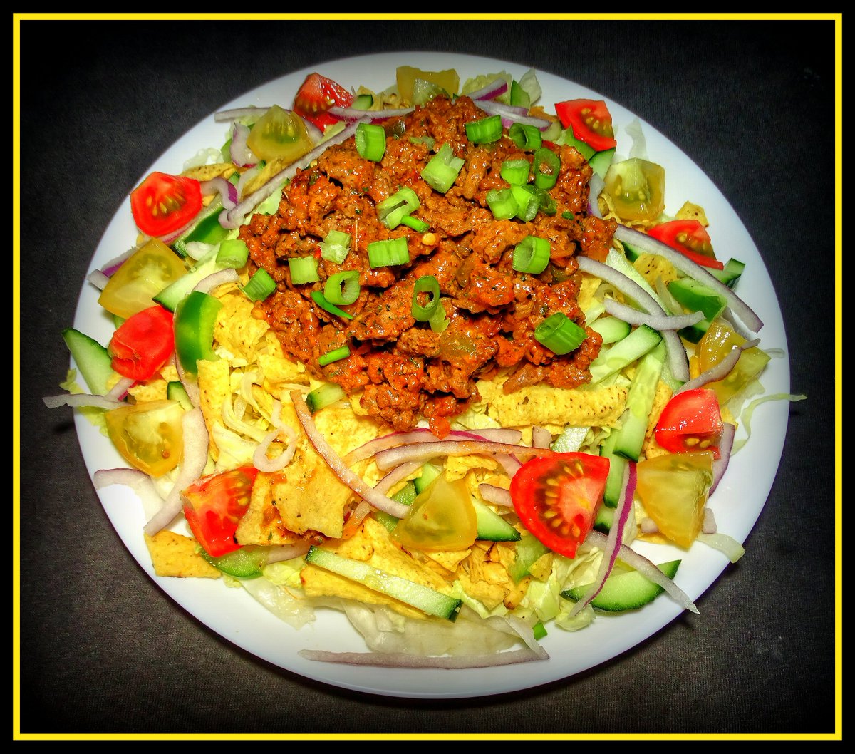 Ground Bison & Jalapeno Jack Cheese Taco Salad #groundbison #bison #jalapenojackcheese #jackcheese #tacosalad #salad #lettuce #tortillachips #redonion #greenpeppers #tomatoes #tomatillosauce #jalapenopeppers #cucumber #greenonions #BothwellCheese #pandemiclife #Manitoba