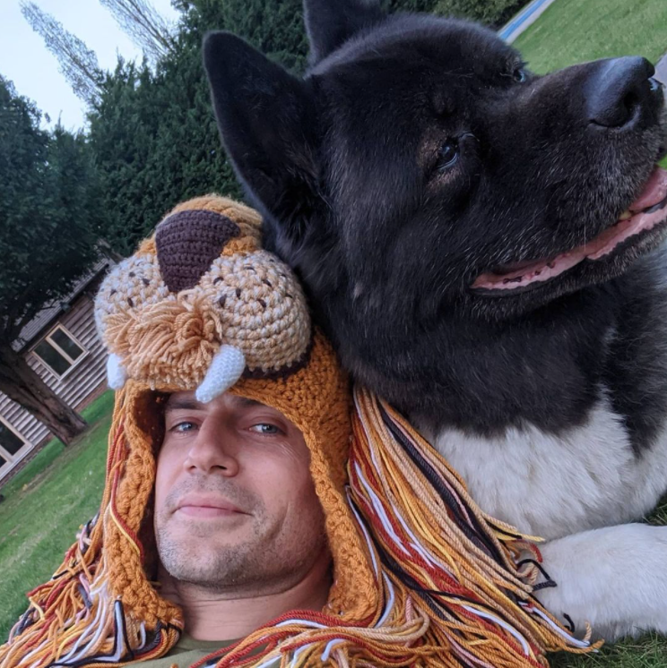 Happy birthday Henry Cavill. here he is with his dog Kal and a lion hat 