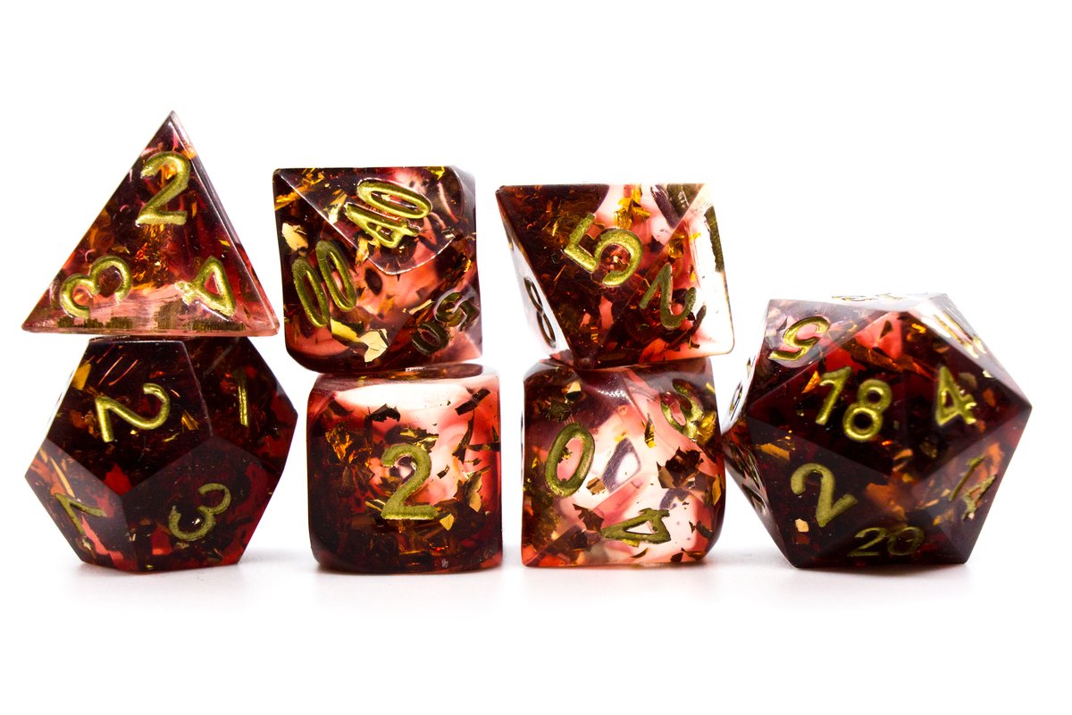 Handmade resin dice in dark red with gold leaf foil inside and gold ink, very minor flaws on some of the facets that face the lid --> 50 Euro excluding shipping.