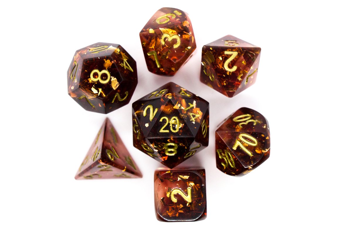 Handmade resin dice in dark red with gold leaf foil inside and gold ink, very minor flaws on some of the facets that face the lid --> 50 Euro excluding shipping.