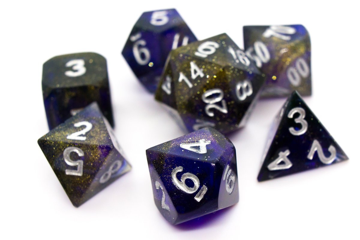Handmade resin dice in dark blue with gold dust and silver ink, very minor flaws on some of the facets that face the lid --> 70 Euro excluding shipping.